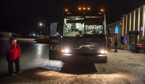 PHIL HOSSACK / WINNIPEG FREE PRESS Driver Doug Stern in the cockpit on Greyhound bus #6181 en-route to Flin Flon sorts paperwork at a ten minute stop in The Pas. See Melissa's story. October 29, 2018