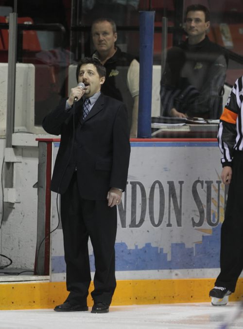 Brandon Sun Mike Waddell sings the national anthem, Wednesday evening at Westman Place. (Colin Corneau/Brandon Sun)