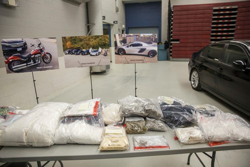 MIKE DEAL / WINNIPEG FREE PRESS
Drugs and vehicles were on display at the MPI depot on Plessis Rd Thursday morning as the WPS, RCMP, Provincial representatives and the Mayor announced that a major Inter-Provincial Illicit Drug Network was dismantled during Project Riverbank. 
181101 - Thursday, November 01, 2018.