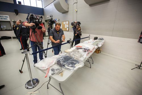 MIKE DEAL / WINNIPEG FREE PRESS
Drugs and vehicles were on display at the MPI depot on Plessis Rd Thursday morning as the WPS, RCMP, Provincial representatives and the Mayor announced that a major Inter-Provincial Illicit Drug Network was dismantled during Project Riverbank. 
181101 - Thursday, November 01, 2018.