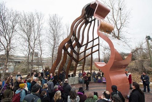 MIKE DEAL / WINNIPEG FREE PRESS
The official unveiling of the sculpture, Niimaamaa, meaning "Mother," at the south point entrance to The Forks at Main Street. Dr. Julie Nagam, Chair of the History of Indigenous Arts of North America and Associate Professor at University of Winnipeg, introduces the three indigenous artists who conceived the work, Val Vint, KC Adams and Jaimie Isaac, who were on hand to dedicate the 30-foot tall metal sculpture of a kneeling pregnant woman. 
181101 - Thursday, November 01, 2018.