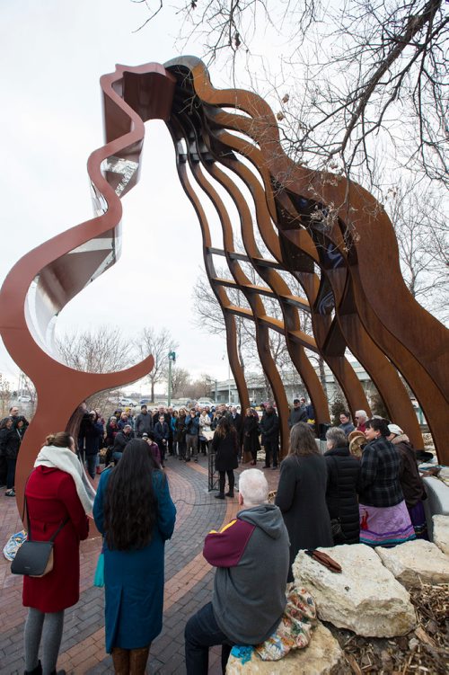 MIKE DEAL / WINNIPEG FREE PRESS
The official unveiling of the sculpture, Niimaamaa, meaning "Mother," at the south point entrance to The Forks at Main Street. Dr. Julie Nagam, Chair of the History of Indigenous Arts of North America and Associate Professor at University of Winnipeg, introduces the three indigenous artists who conceived the work, Val Vint, KC Adams and Jaimie Isaac, who were on hand to dedicate the 30-foot tall metal sculpture of a kneeling pregnant woman. 
181101 - Thursday, November 01, 2018.