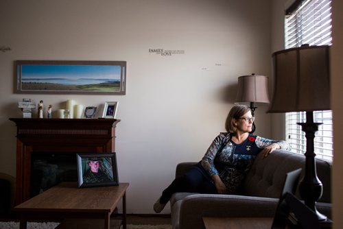 MIKAELA MACKENZIE / WINNIPEG FREE PRESS
Anita Cenerini, who fought for her son to receive full military honours after his suicide and is the 2018 National Silver Cross Mother, poses for a portrait in her home in Winnipeg on Thursday, Nov. 1, 2018. 
Winnipeg Free Press 2018.