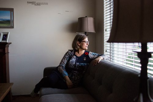 MIKAELA MACKENZIE / WINNIPEG FREE PRESS
Anita Cenerini, who fought for her son to receive full military honours after his suicide and is the 2018 National Silver Cross Mother, poses for a portrait in her home in Winnipeg on Thursday, Nov. 1, 2018. 
Winnipeg Free Press 2018.