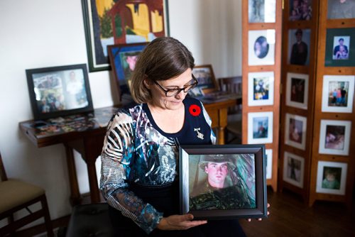 MIKAELA MACKENZIE / WINNIPEG FREE PRESS
Anita Cenerini, who fought for her son to receive full military honours after his suicide and is the 2018 National Silver Cross Mother, poses for a portrait in her home in Winnipeg on Thursday, Nov. 1, 2018. 
Winnipeg Free Press 2018.