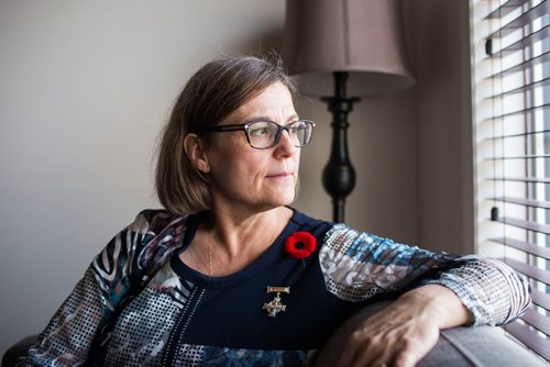 MIKAELA MACKENZIE / WINNIPEG FREE PRESS
Anita Cenerini, who fought for her son to receive full military honours after his suicide and is the 2018 National Silver Cross Mother, poses for a portrait in her home in Winnipeg on Thursday, Nov. 1, 2018. 
Winnipeg Free Press 2018.