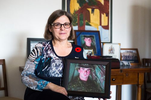 MIKAELA MACKENZIE / WINNIPEG FREE PRESS
Anita Cenerini, who fought for her son to receive full military honours after his suicide and is the 2018 National Silver Cross Mother, poses for a portrait in her home in Winnipeg on Thursday, Nov. 1, 2018. 
Winnipeg Free Press 2018.