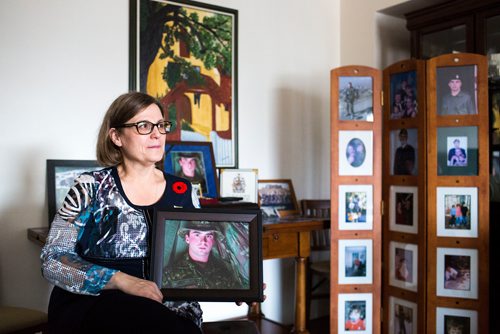 MIKAELA MACKENZIE / WINNIPEG FREE PRESS
Anita Cenerini, who fought for her son to receive full military honours after his suicide and is the 2018 National Silver Cross Mother, poses for a portrait in her home in Winnipeg on Thursday, Nov. 1, 2018. 
Winnipeg Free Press 2018.