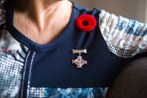 MIKAELA MACKENZIE / WINNIPEG FREE PRESS
Anita Cenerini, who fought for her son to receive full military honours after his suicide and is the 2018 National Silver Cross Mother, poses for a portrait in her home in Winnipeg on Thursday, Nov. 1, 2018. 
Winnipeg Free Press 2018.