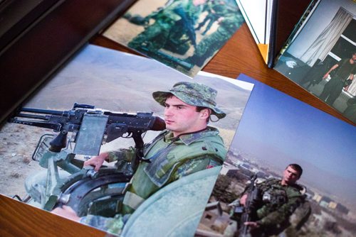 MIKAELA MACKENZIE / WINNIPEG FREE PRESS
Anita Cenerini, who fought for her son to receive full military honours after his suicide and is the 2018 National Silver Cross Mother, looks through photos of her son in her home in Winnipeg on Thursday, Nov. 1, 2018. 
Winnipeg Free Press 2018.