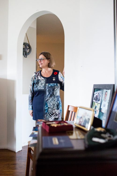 MIKAELA MACKENZIE / WINNIPEG FREE PRESS
Anita Cenerini, who fought for her son to receive full military honours after his suicide and is the 2018 National Silver Cross Mother, poses for a portrait in her home in Winnipeg on Thursday, Nov. 1, 2018. 
Winnipeg Free Press 2018.