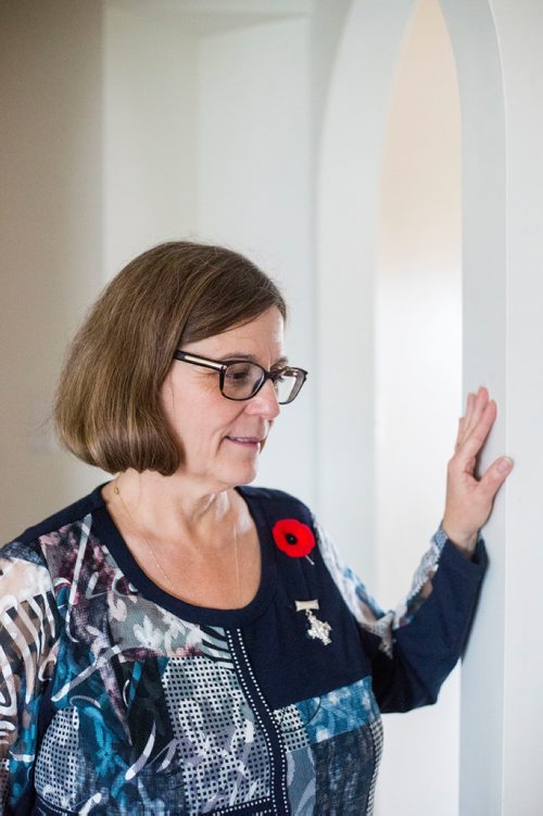 MIKAELA MACKENZIE / WINNIPEG FREE PRESS
Anita Cenerini, who fought for her son to receive full military honours after his suicide and is the 2018 National Silver Cross Mother, poses for a portrait in her home in Winnipeg on Thursday, Nov. 1, 2018. 
Winnipeg Free Press 2018.