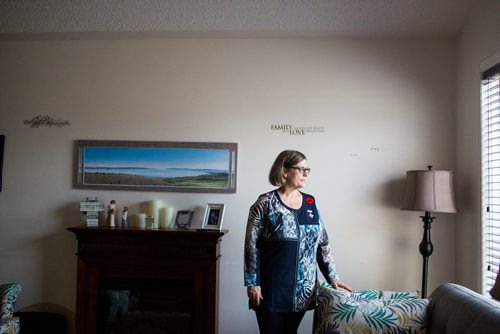 MIKAELA MACKENZIE / WINNIPEG FREE PRESS
Anita Cenerini, who fought for her son to receive full military honours after his suicide and is the 2018 National Silver Cross Mother, poses for a portrait in her home in Winnipeg on Thursday, Nov. 1, 2018. 
Winnipeg Free Press 2018.