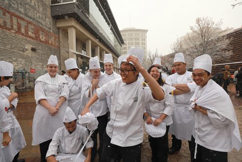 RUTH BONNEVILLE / WINNIPEG FREE PRESS

Standup 

Patisserie students at Red River College Paterson Global Foods Institute in Old Market Square laugh as they try to stay warm and dry from the falling snow after having to evacuate the building during class when a fire alarm went off over the lunch hour Friday. They were given the all-lear to return to class without incident soon after.  

Standup photo 

Nov 2nd , 2018