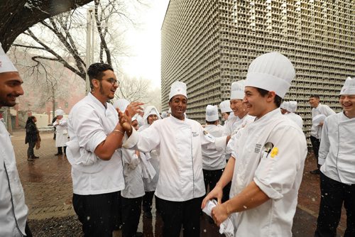 RUTH BONNEVILLE / WINNIPEG FREE PRESS

Standup 

Short order culinary arts students at Red River College Paterson Global Foods Institute in Old Market Square, laugh as they try to stay warm and dry from the falling snow after having to evacuate the building during class when a fire alarm went off over the lunch hour Friday. They were given the all-lear to return to class without incident soon after.  

Standup photo 

Nov 2nd , 2018