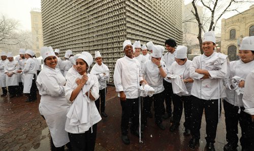 RUTH BONNEVILLE / WINNIPEG FREE PRESS

Standup 

Short order culinary arts students at Red River College Paterson Global Foods Institute in Old Market Square, laugh as they try to stay warm and dry from the falling snow after having to evacuate the building during class when a fire alarm went off over the lunch hour Friday. They were given the all-clear to return to class without incident soon after.  

Standup photo 

Nov 2nd , 2018