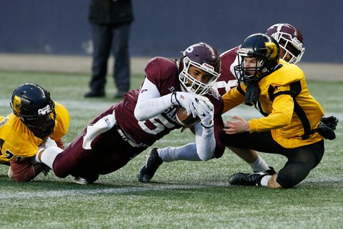 JOHN WOODS / WINNIPEG FREE PRESS
St Paul's Crusaders' Te Jessie (5) scores against the Dakota Lancers' (21)(unidentified on roster) and Hugh Irvine (4) in the Winnipeg High School semi finals  Friday, November 2, 2018.