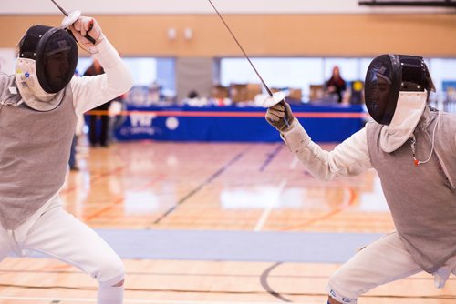 MIKAELA MACKENZIE / WINNIPEG FREE PRESS
Liam Prokopowich (left) and Noah Merz Lakser compete in the Canada Cup West fencing tournament at the Qualico Centre in Winnipeg on Saturday, Nov. 3, 2018. 
Winnipeg Free Press 2018.