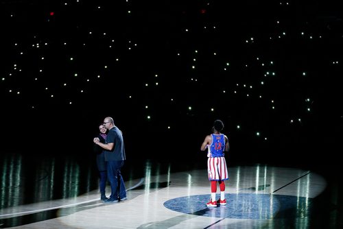 JOHN WOODS / WINNIPEG FREE PRESS
Trina and Norbert Viallet, who have been married fourteen years, dance at centre court as Ant of the Harlem Globetrotters looks on during their show in Winnipeg Sunday, November 4, 2018.