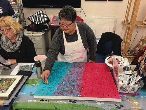 Canstar Community News Joy Matsubara, president of the Local Colour Art Group, works on an abstract painting for the group's winter art show, which runs Nov. 16 to 18 at 180 Poplar Ave. (SHELDON BIRNIE/CANSTAR/THE HERALD)