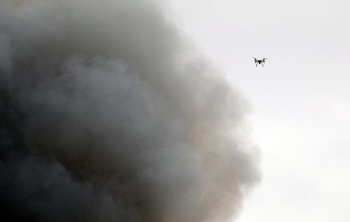 PHIL HOSSACK / WINNIPEG FREE PRESS - City firefighters operae a drone around fighting a fire at an oil seed crushing plant on (Google Earth lists the building as Friendly Family Farms) Dawson Road Monday afternoon. - November 05, 2018