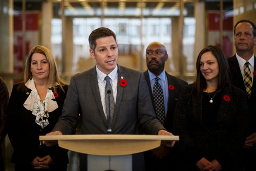 MIKE DEAL / WINNIPEG FREE PRESS
Mayor Brian Bowman announces his appointments to the Executive Policy Committee, and his selections for Deputy Mayor and Acting Deputy Mayor at City Hall Monday afternoon.
Behind Mayor Bowman are councillors (from left); Cindy Gilroy, Markus Chambers, Sherri Rollins and John Orlikow.
181105 - Monday, November 05, 2018.