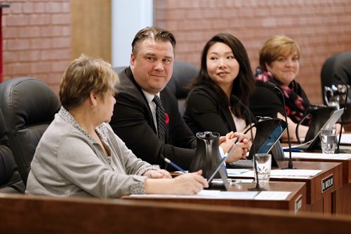 JOHN WOODS / WINNIPEG FREE PRESS
From left, Mark Wasyliw, ?Yijie Chen and ?Lisa Naylor listen in as Linda Schatkowsky speaks at the first Winnipeg School Board meeting for the 2018-19 school year Monday, November 5, 2018.