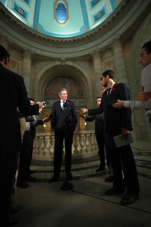 RUTH BONNEVILLE / WINNIPEG FREE PRESS

Premier Brian Pallister answers questions from the media regarding the carbon tax issue with Trudeau's  feds  after question period in the house, in the rotunda at the  Legislative Building Tuesday.


Nov 6th , 2018