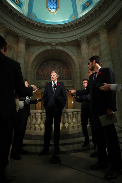 RUTH BONNEVILLE / WINNIPEG FREE PRESS

Premier Brian Pallister answers questions from the media regarding the carbon tax issue with Trudeau's  feds  after question period in the house, in the rotunda at the  Legislative Building Tuesday.


Nov 6th , 2018