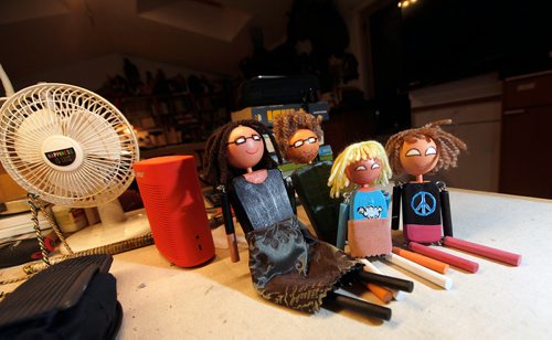 PHIL HOSSACK / WINNIPEG FREE PRESS -Gord and Megan Wilding and their daughters Jasper Lily 12, and Laine 8, reproduced as marionettes sit on a table in their fstudio Tuesday night in their St Francios Xavier home. See Sanderson's story.  - November 6, 2018