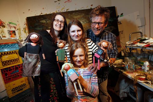 PHIL HOSSACK / WINNIPEG FREE PRESS -Gord and Megan Wilding pose with their daughters Jasper Lily 12, and Laine 8, showng off marionettes painted to resemble their family Tuesday night in their St Francios Xavier home. See Sanderson's story.  - November 6, 2018