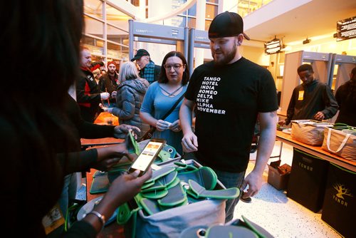 JOHN WOODS / WINNIPEG FREE PRESS
Jake and Erin Doty's cell phones are placed in security pouches before the Jack White concert at the BellMTS Place Tuesday, November 6, 2018.