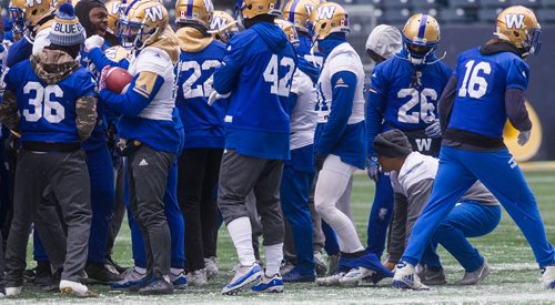MIKE DEAL / WINNIPEG FREE PRESS
Winnipeg Blue Bombers' Daniel Petermann (81) is panted by Justin Medlock (9) during practice at Investors Group Field Wednesday morning.
181107 - Wednesday, November 07, 2018.