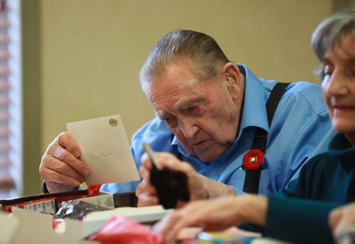 RUTH BONNEVILLE / WINNIPEG FREE PRESS

Standup 
Jack Sellers, who served in the 2nd World War (Jack was a pilot and his wife in entertainment), helps put together gift boxes with cards and items that are special reminders of home to be given to our deployed soldiers serving overseas for Christmas, at Sturgeon Creek II Retirement Residence  on 707 Setter Ave. Wednesday. 

More info: The Team at All Seniors Care Living Centres are proud to announce that we did it again this year!  On November 7th, the residents at our Sturgeon Creek II Retirement Residence will be representing the entire All Seniors Care family in Canada when they present military representatives with cards and gift boxes containing special reminders of home to be given to our deployed soldiers at Christmas.

Nov 7th , 2018
