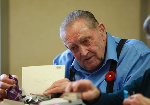 RUTH BONNEVILLE / WINNIPEG FREE PRESS

Standup 
Jack Sellers, who served in the 2nd World War (Jack was a pilot and his wife in entertainment), helps put together gift boxes with cards and items that are special reminders of home to be given to our deployed soldiers serving overseas for Christmas, at Sturgeon Creek II Retirement Residence  on 707 Setter Ave. Wednesday. 

More info: The Team at All Seniors Care Living Centres are proud to announce that we did it again this year!  On November 7th, the residents at our Sturgeon Creek II Retirement Residence will be representing the entire All Seniors Care family in Canada when they present military representatives with cards and gift boxes containing special reminders of home to be given to our deployed soldiers at Christmas.

Nov 7th , 2018