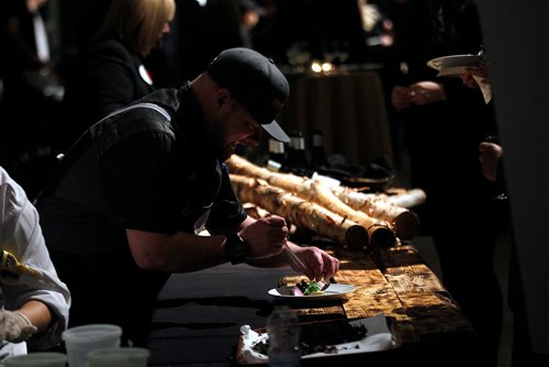 PHIL HOSSACK / WINNIPEG FREE PRESS - Chef Tim Palmer from the VG@Fairmont applies the finishing touches tohis contribution as Food, great food was on the menu Thursday evening at Canada's Great Kitchen Party. Patrons lined up deep to enjoy samples from some of the city's best Chef's and more.  November 8, 2018