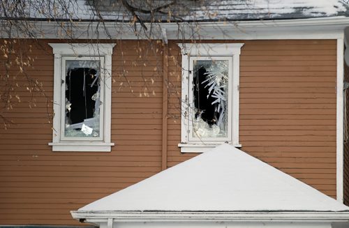 PHIL HOSSACK / WINNIPEG FREE PRESS - Shattered windows at 335 Bannerman where a gunaman held police at bay Wednesday. - November 8, 2018