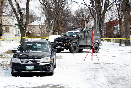 PHIL HOSSACK / WINNIPEG FREE PRESS -The police armoured vehicle sits where it has for three days in front of 335 Bannerman where a gunaman held police at bay Wednesday. - November 8, 2018