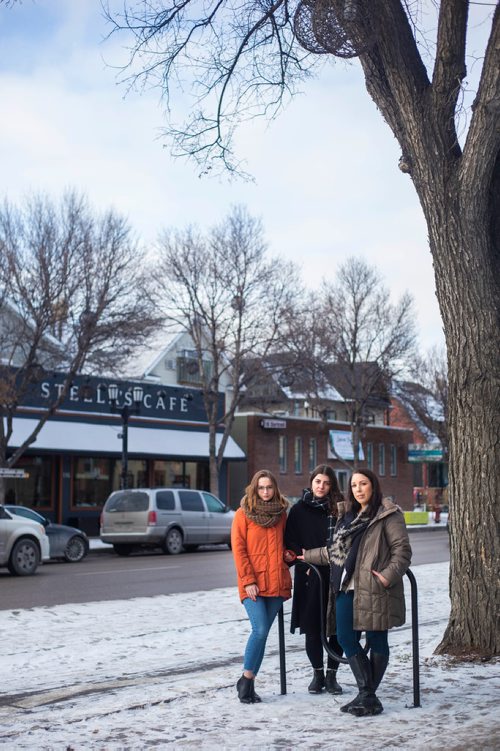 MIKAELA MACKENZIE / WINNIPEG FREE PRESS
Kelsey Wade (left), Christina Hajjar, and Amanda Murdock pose by Stella's on Sherbrook in Winnipeg on Friday, Nov. 9, 2018. The three of them are speaking out about a workplace culture of harassment at the popular Winnipeg restaurant.
Winnipeg Free Press 2018.