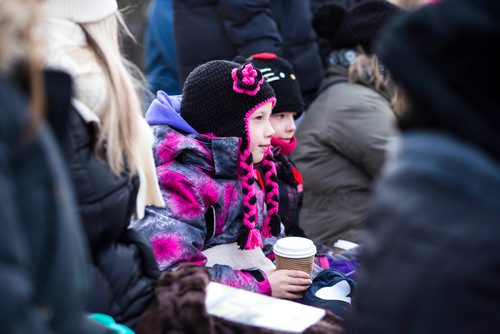 MIKAELA MACKENZIE / WINNIPEG FREE PRESS
Isla Monro, seven, stays warm before the Royal Winnipeg Rifles host a 135th anniversary commemoration service and unveiling of the Legacy Stone Project at Vimy Ridge Memorial Park  in Winnipeg on Saturday, Nov. 10, 2018. 
Winnipeg Free Press 2018.