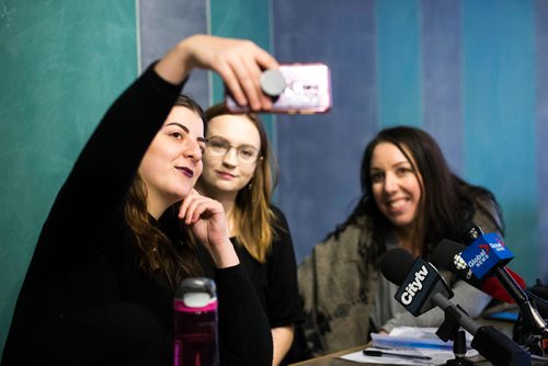 MIKAELA MACKENZIE / WINNIPEG FREE PRESS
Christina Hajjar (left), Kelsey Wade, and Amanda Murdock (all former Stella's employees) take a selfie together before hosting a press conference about harassment and labour violations at Stella's in Winnipeg on Saturday, Nov. 10, 2018. 
Winnipeg Free Press 2018.