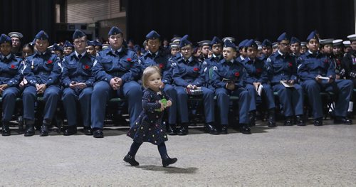 TREVOR HAGAN / WINNIPEG FREE PRESS
Danika Trenouth, 17mo, in front of cadets during the Remembrance Day service at the Convention Centre, Sunday, November 11, 2018.