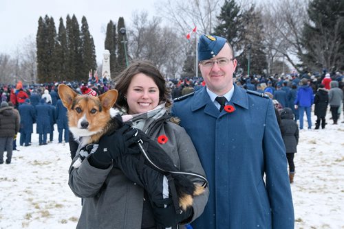 Mike Sudoma / Winnipeg Free Press
(left to right) Maude Vallieres-Blouin, Joel Tourigny and their dog Sammy taking in the Remembrance Day Service in Bruce Park Sunday morning. November 11, 2018