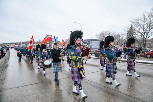 Mike Sudoma / Winnipeg Free Press
The 402 Squadron Pipes and Drums Band lead Sunday morning's Remembrance Day Parade down Portage Avenue. The Parade starts after the Remembrance Day service at Bruce Park and ends at the Royal Canadian Legion 4 at the corner of Portage and Brooklyn St. in St James. November 11, 2018