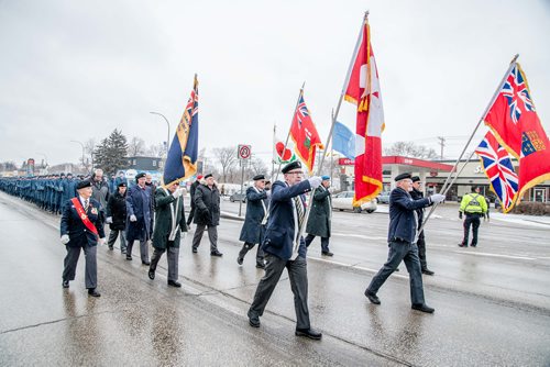 Mike Sudoma / Winnipeg Free Press
Members of the Canadian Legion raise their colours and lead the soldiers down Portage Avenue during Sunday morning's Remembrance Day Parade. November 11, 2018