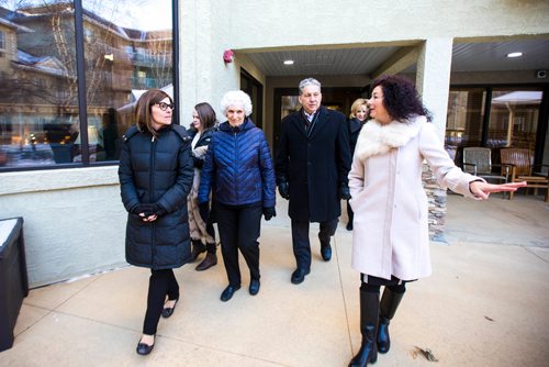 MIKAELA MACKENZIE / WINNIPEG FREE PRESS
Filomena Tassi, Minister of Seniors (left), takes a walk in the courtyard with Laurine Einfeld, Dan Vandal, and Chantal Wiebe during a visit to the the Seine River Retirement Residence in Winnipeg on Monday, Nov. 12, 2018. Tassi is touring organizations that are encouraging seniors in their community to remain active and healthy as they age.
Winnipeg Free Press 2018.