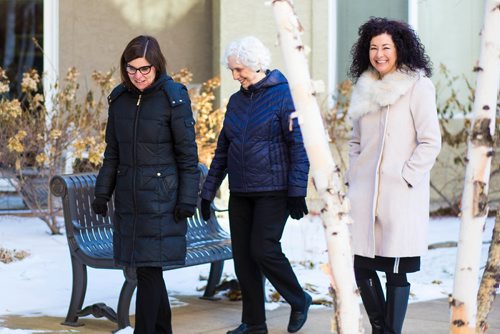 MIKAELA MACKENZIE / WINNIPEG FREE PRESS
Filomena Tassi, Minister of Seniors (left), takes a walk in the courtyard with Laurine Einfeld and Chantal Wiebe during a visit to the the Seine River Retirement Residence in Winnipeg on Monday, Nov. 12, 2018. Tassi is touring organizations that are encouraging seniors in their community to remain active and healthy as they age.
Winnipeg Free Press 2018.