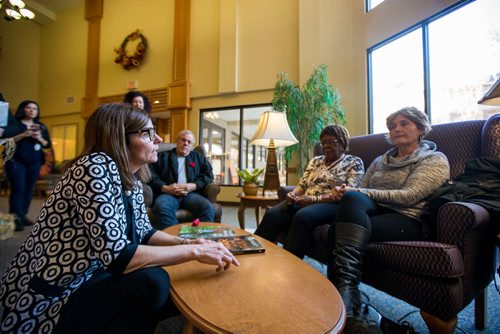MIKAELA MACKENZIE / WINNIPEG FREE PRESS
Filomena Tassi, Minister of Seniors (left), talks with Carmen Nembhardt and Elizabeth Franklin while visiting the Seine River Retirement Residence in Winnipeg on Monday, Nov. 12, 2018. Tassi is touring organizations that are encouraging seniors in their community to remain active and healthy as they age.
Winnipeg Free Press 2018.