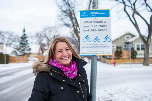 MIKAELA MACKENZIE / WINNIPEG FREE PRESS
Cindy Gilroy, city councillor, poses for a portrait by the sign asking for input into a bike lane on Wolseley Avenue in Winnipeg on Monday, Nov. 12, 2018. 
Winnipeg Free Press 2018.