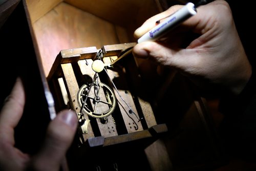 JOHN WOODS / WINNIPEG FREE PRESS
Murray Beilby is photographed with some of his clock collection Tuesday, November 12, 2018.